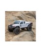 „Axial 1/24 SCX24 Base Camp 4WD Rock Crawler Brushed RTR“ su akumuliatoriumi ir įkrovikliu, baltas
